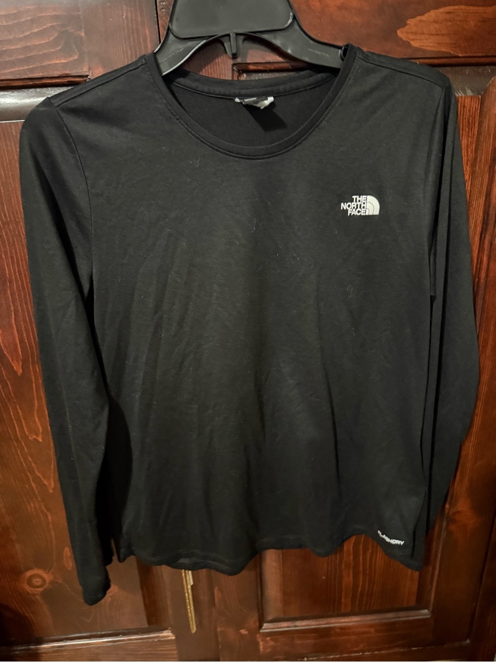 The North Face women’s Black Long-Sleeve Crew Tee